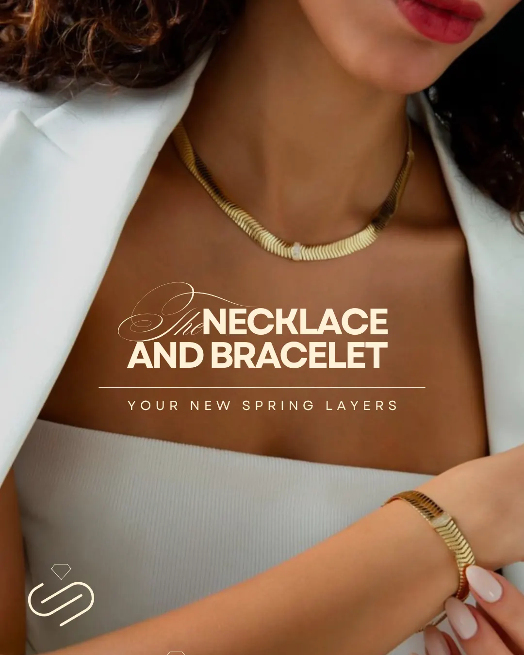 Argjendari Subashi spring campaign frame — a gold herringbone necklace and matching bracelet worn over a white blazer.