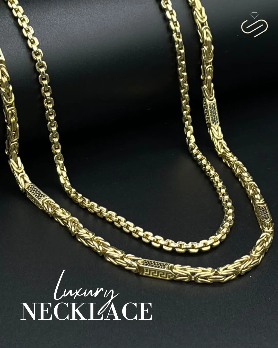 Argjendari Subashi flat lay of two gold byzantine chains on dark slate, captioned Luxury Necklace.